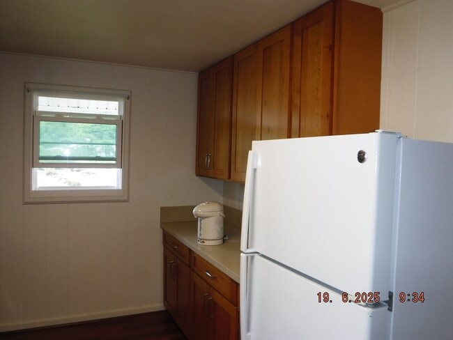 Building Photo - At Home in Manoa 2/1/1