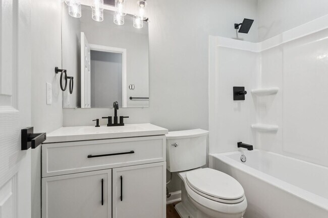 Building Photo - Updated Four bedroom, two full bathroom home