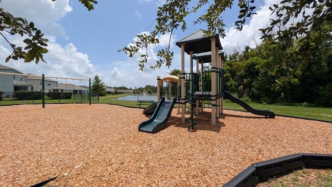 Building Photo - MOVE IN READY ! 4 BEDROOM/2 BATH! TILE- LVP THROUGHOUT! LAWN MOWING INCLUDED!
