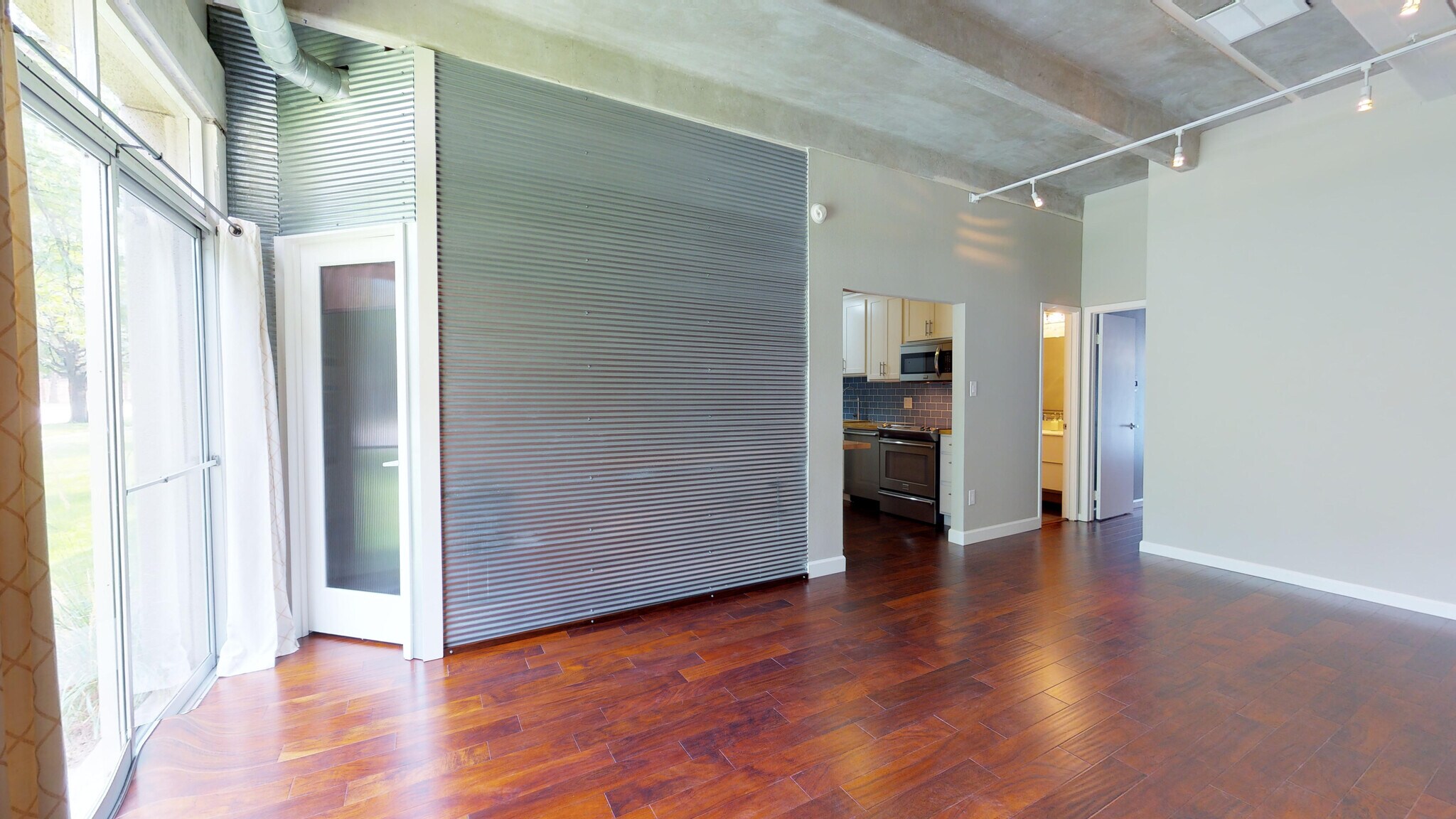 Door to additional room/storage space - 675 S University Blvd