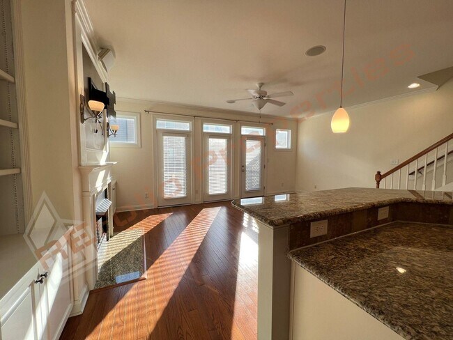 Building Photo - Elegant 3 Story 3 Bedroom Formal Model Tow...