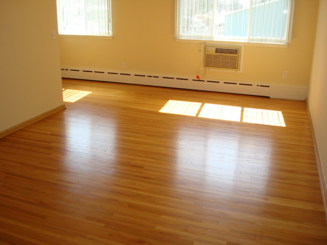 Living Room Natural Hardwood Floors - 4150 Regent Ave N