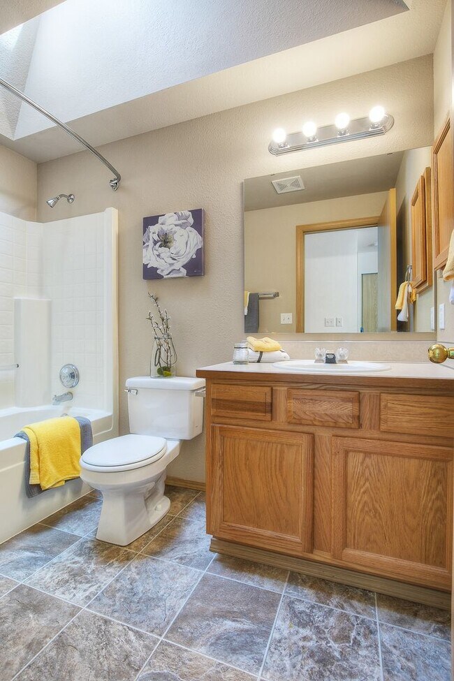 Building Photo - Main floor master - A/C home with 4 bedrooms formal living/dining and great room! Olympia School ...