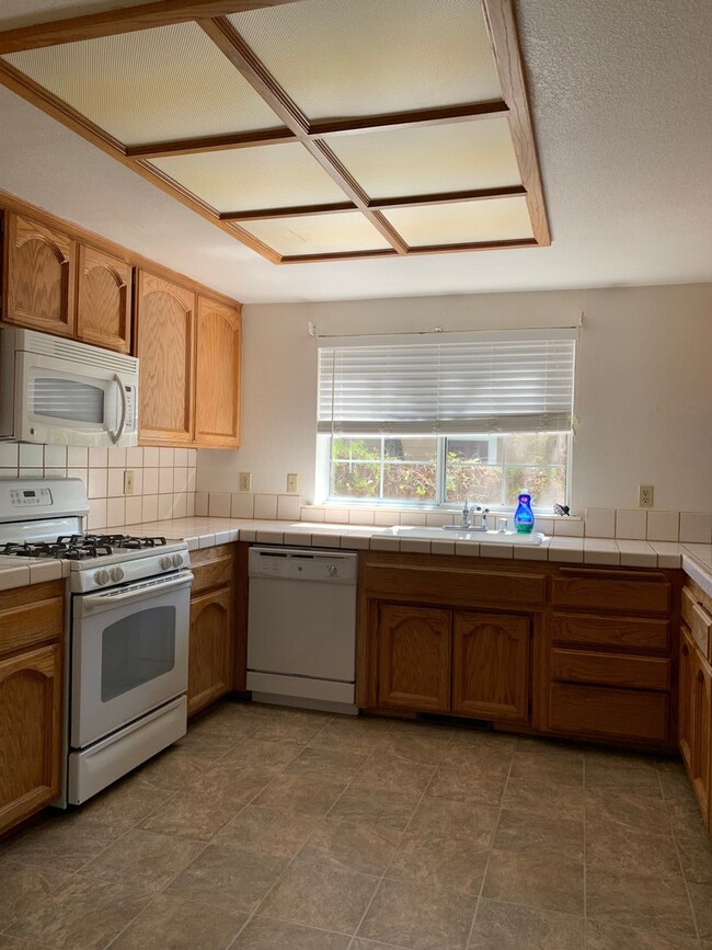 Building Photo - Spacious 3-Bedroom Home with Greenbelt Views & Landscaping Included