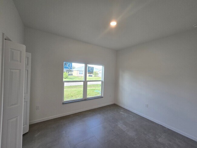 Building Photo - BRAND NEW 2/2/1 -SW LEHIGH ACRES