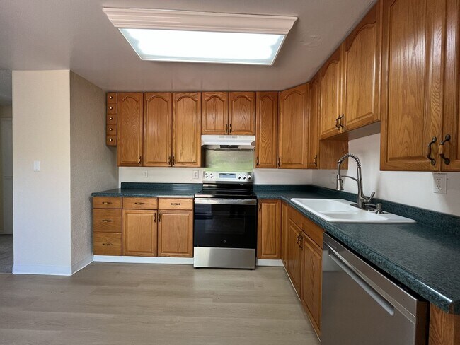 Building Photo - Charming Ranch Home with Sunroom or 4th Bedroom, Two-Car Garage and Fenced Backyard