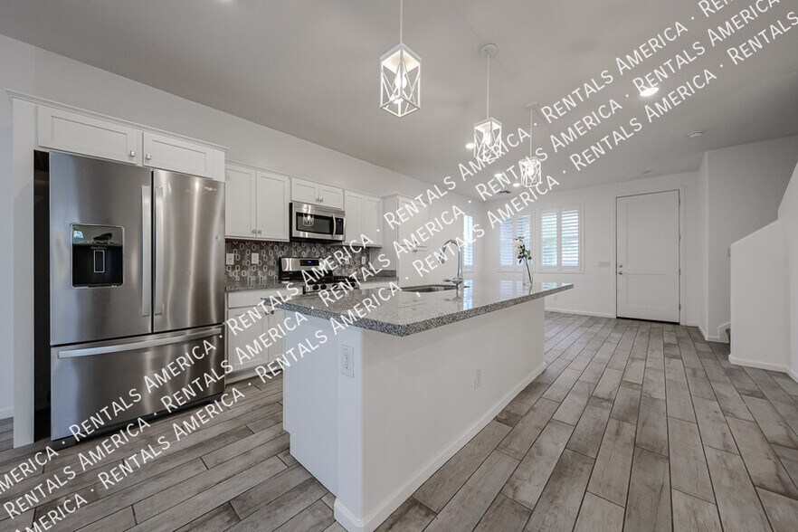 Building Photo - 1857 W 22nd Ave