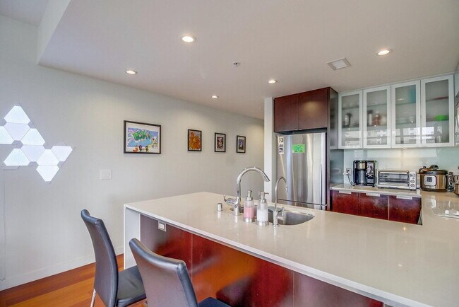 Building Photo - Skyline Views & Sophisticated Corner Living at Aria in Cortez Hill
