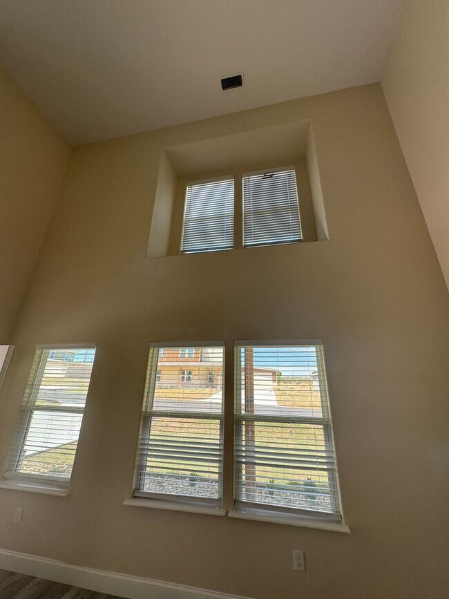 Building Photo - Beautiful modern Townhome in Peaster ISD NO Water Bill -  Fenced Yard - GATED: Spring Move in Spe...