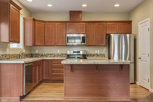 Building Photo - 4 bedrooms 2.5 baths 1826 sq.ft. Olympia School District