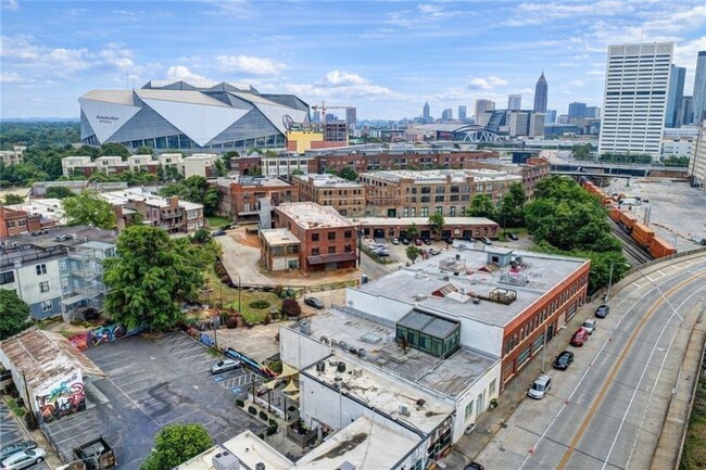 Building Photo - Historic Castleberry Hill Condo with Gated Parking and Skyline Views