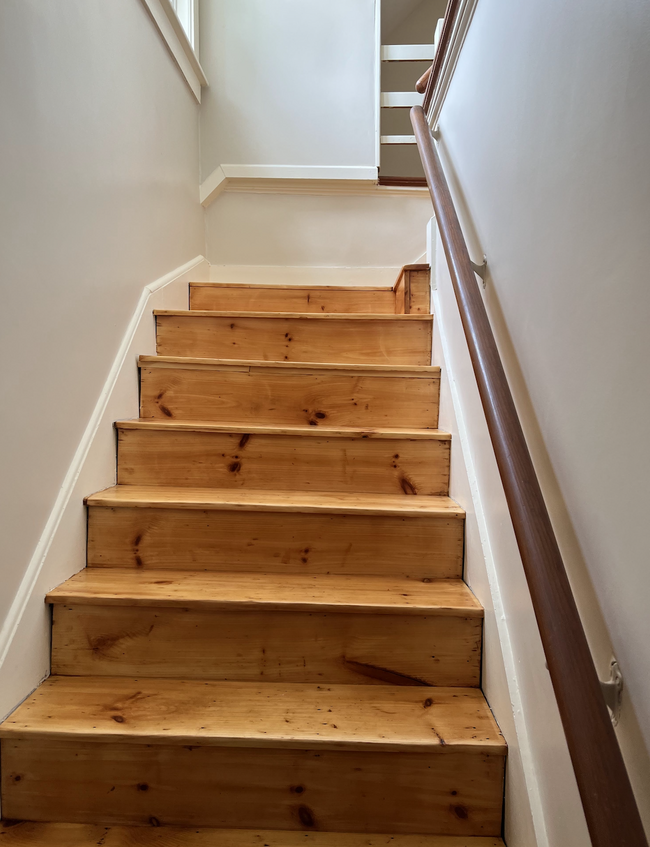 Stairs leading to second floor of unit - 310 Chapman St