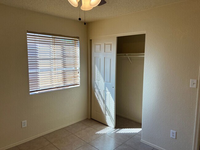 Building Photo - Four Bedroom Mountain View Home with large fenced back yard and double gates