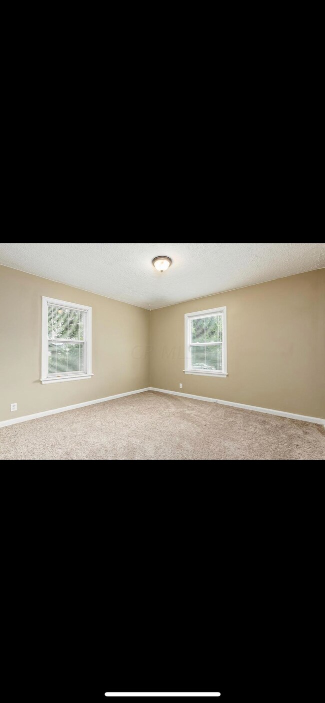 Building Photo - 1246 E 22nd Ave