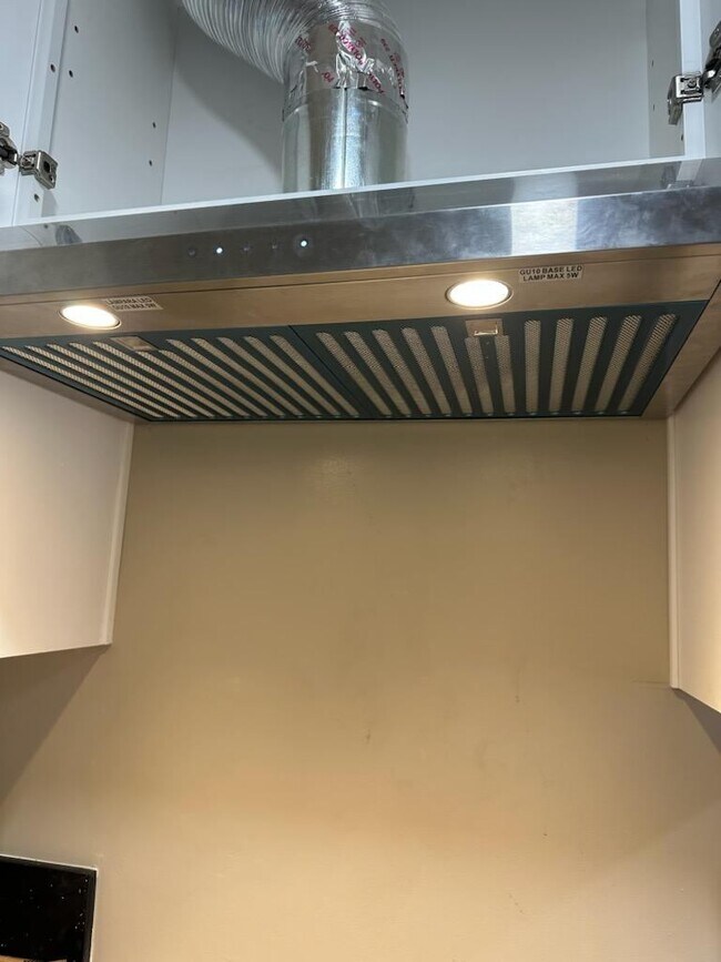 Stove with exhaust fan - 1533 Hauser Blvd