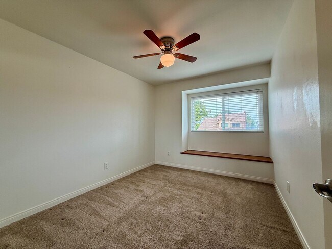 Building Photo - Spacious 4 Bedroom House with Large Fenced Yard! Landscaping Included! Two Car Garage!