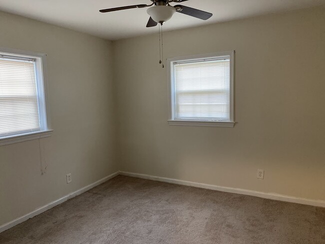 downstairs bedroom with closet - 3705 Pfost Ave