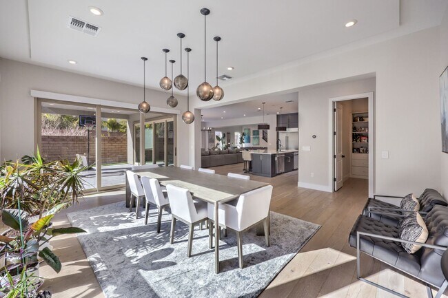 Building Photo - Exquisite 6-bed/ 6-bath residence nestled within the prestigious, guard-gated community of Revere...