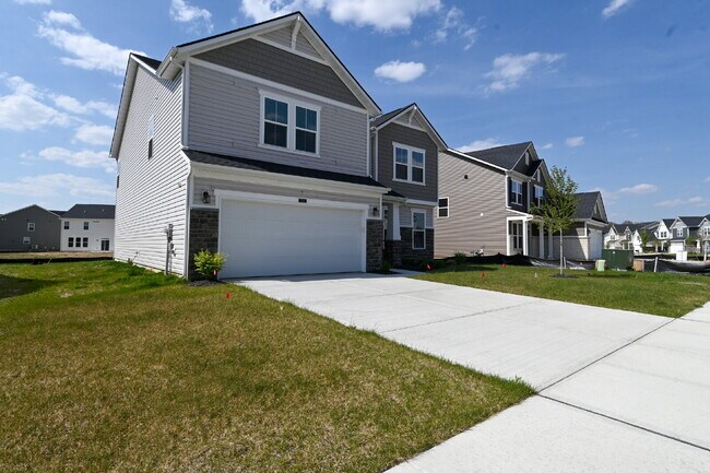 Building Photo - "Spacious 5-Bedroom Retreat with Luxurious Quartz Countertops & Fireplace on Deerberg Drive!"