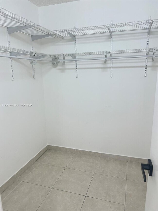 Building Photo - 9911 W Okeechobee Rd