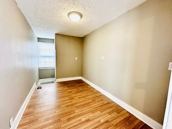 Building Photo - 2BR Corner lot house now available near Ch...