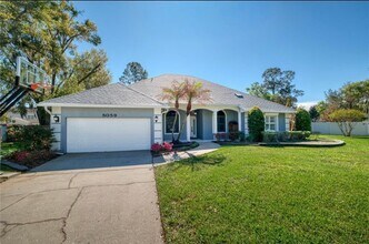 Building Photo - 5059 Knotty Pine Ct