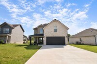 Building Photo - Pet Friendly Three Bedroom with Bonus!