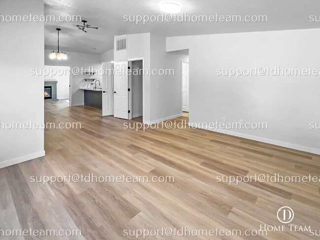 Building Photo - "Charming 3-Bedroom Retreat with Cozy Fire...