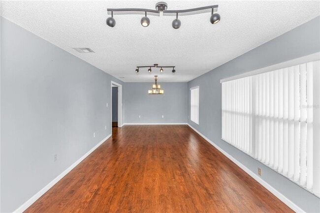 Building Photo - 8315 Village Green Rd