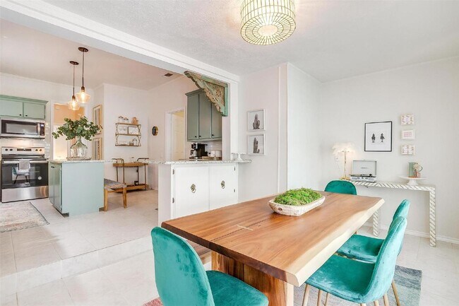Building Photo - Charming 2-Bed, 2-Bath Gem with Granite Co...