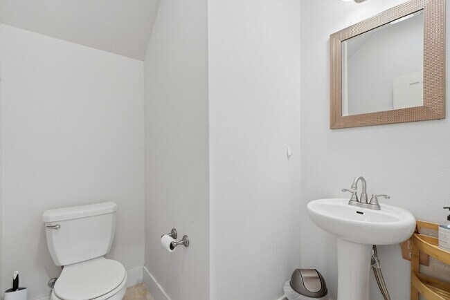 Building Photo - Stunner! This beautiful home features a spacious open floor plan with primary suite and private o...