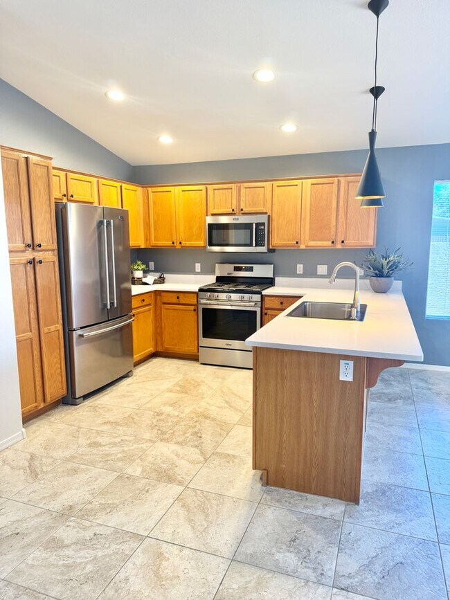 Building Photo - Meticulously Maintained 3 Bedroom + Den Single Level Home! Fantastic Low Backyard.