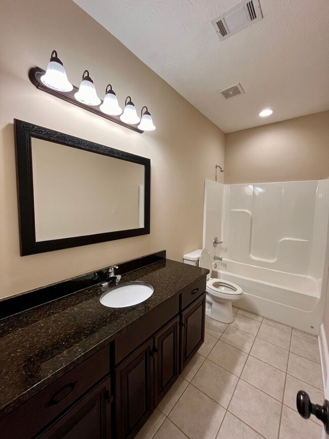 Building Photo - Spacious 3-Bedroom Home with Garage, Large...