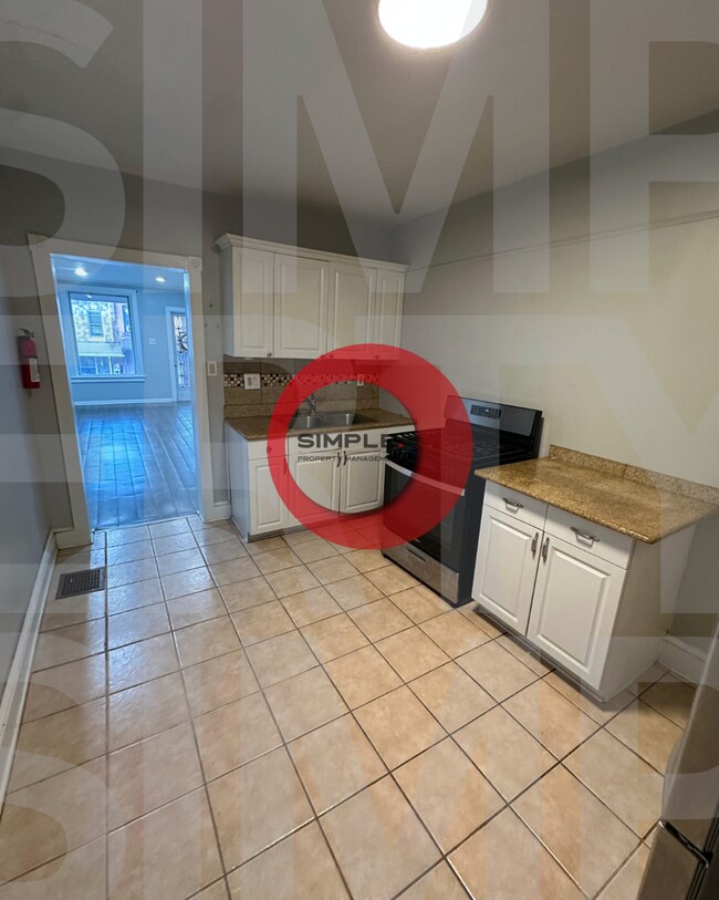 Building Photo - Three Bedroom one bath with off street parking