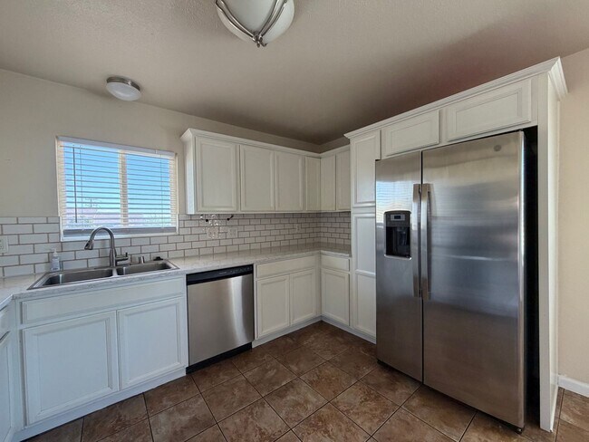 Building Photo - 3 Bedroom 2 Bathroom House with Central A/C , 2 Car Garage and Beautiful Backyard with Covered Patio