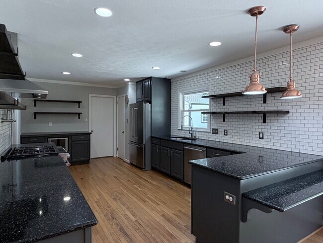 Building Photo - Updated 3BR Home in Beaver Lake | Fenced Yard, Garage, Covered Porch & Outdoor Fireplace | Pet Fr...