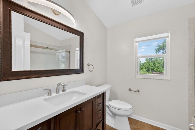 Building Photo - Available Now! Waterfront Living at Its Best – Pool, Decks & Gated Privacy