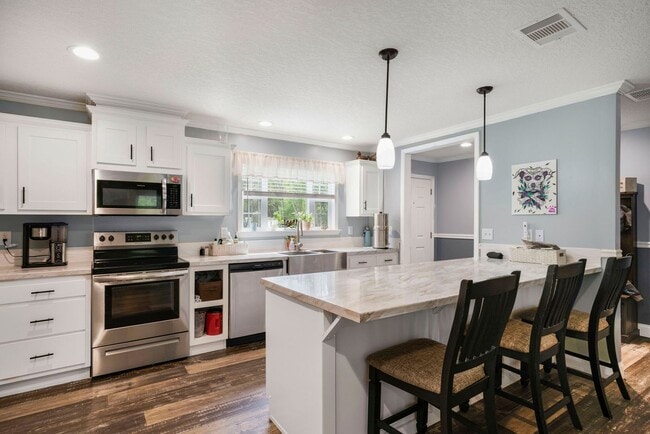 Building Photo - Charming 3/2 in the Heart of Williston – U...