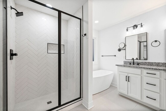 Building Photo - Pet Friendly Three Bedroom with Bonus!