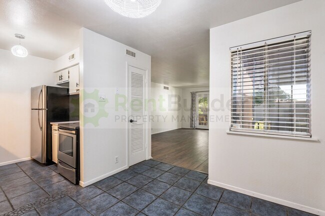 Building Photo - CHECK OUT THE POOLSIDE VIEW!!  **ALL UTILITIES ARE INCLUDED & REDUCED PRICE FOR JULY!