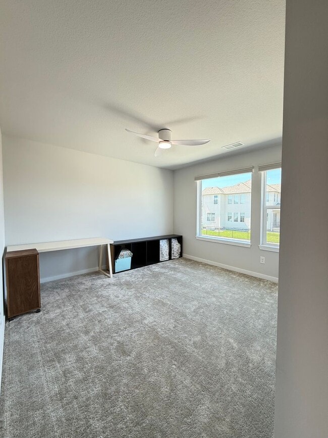 Building Photo - Stunning Luxury Living in Coal Creek with ...