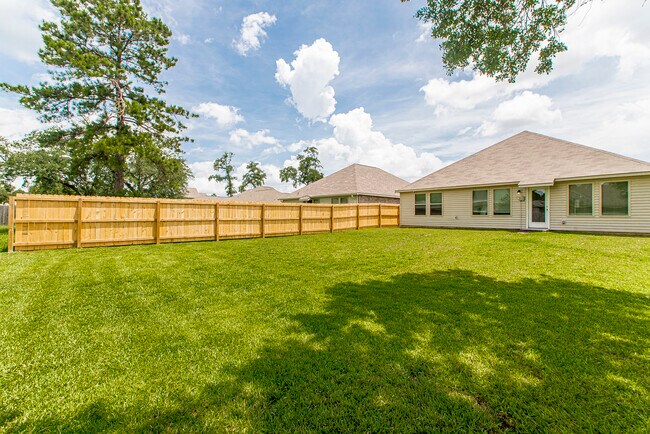 View from the left side of backyard to the house - 48465 Red Fox Dr
