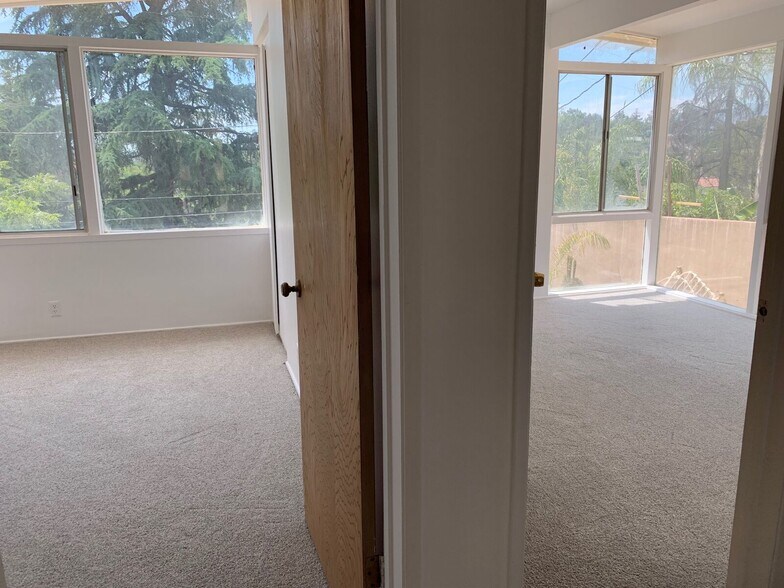 Divider between bedrooms 1 & 2 - 10458 Pearson Pl
