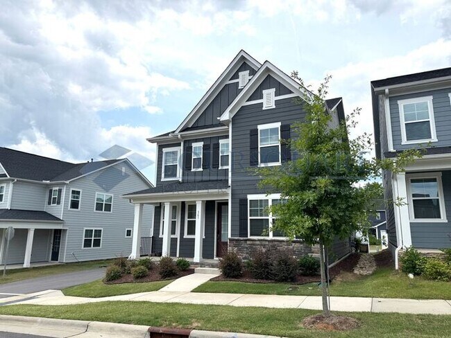 Building Photo - Spacious Corner-Lot Home with Guest Suite, Screened Porch & Detached 2-Car Garage – Resort-Style ...