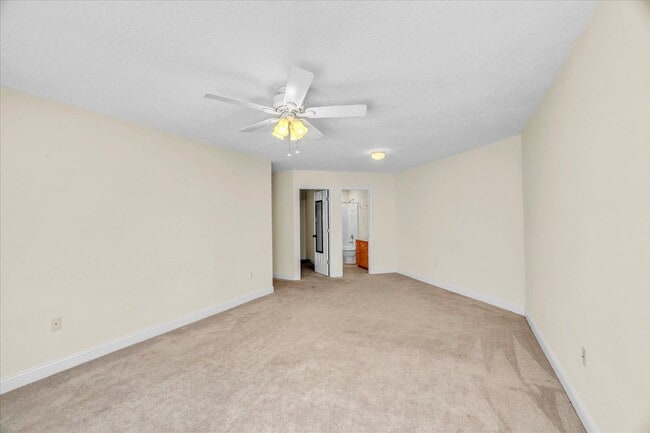 Building Photo - Stunning all-brick home on a large wooded lot