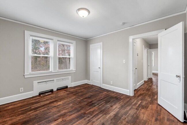 Building Photo - SW, Large Brick Two Bedroom PLUS Two Sun-Rooms, Hardwoods, LR & Separate DR, Fire Place!