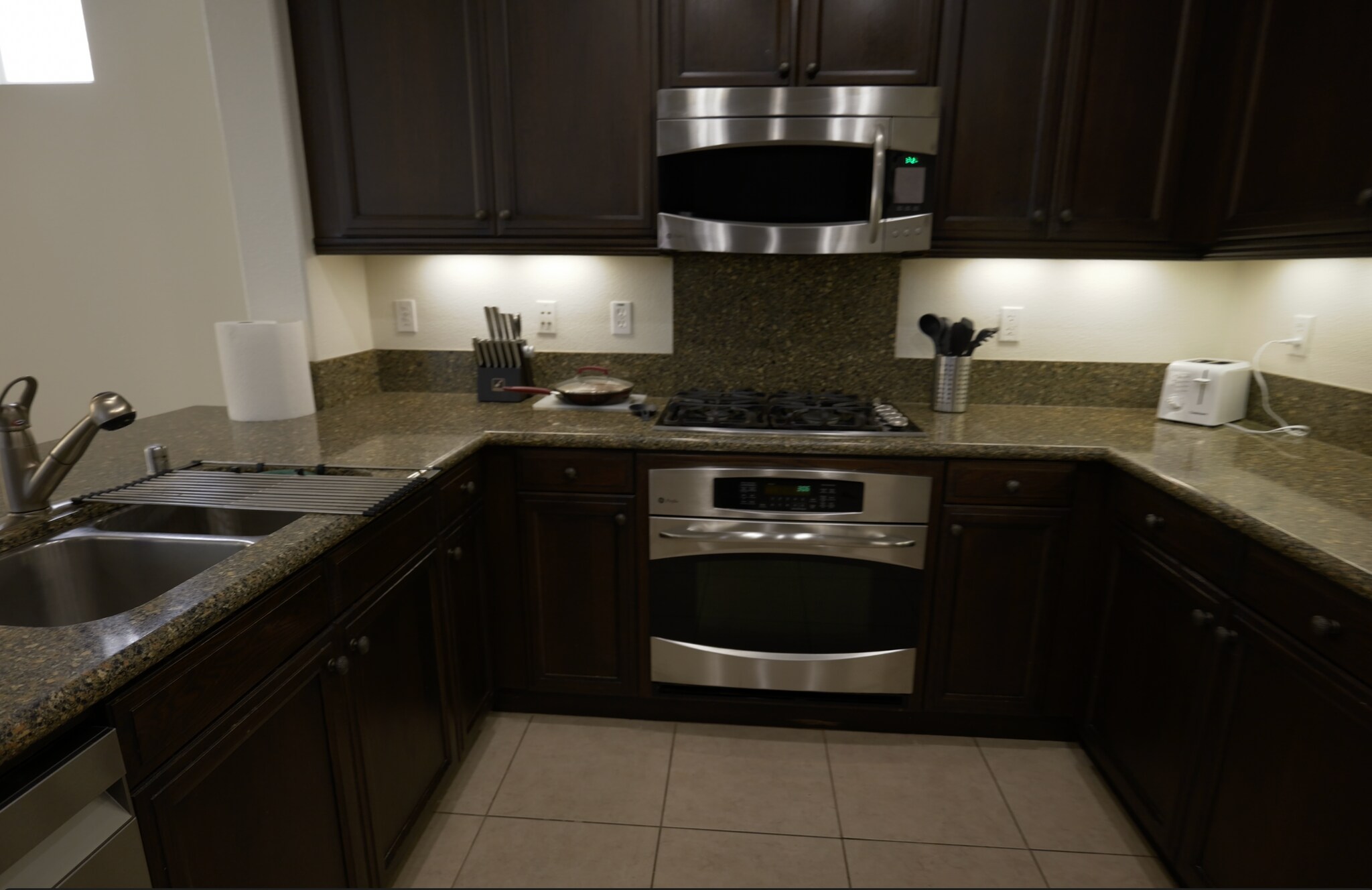 open kitchen with gas range and appliances - 2985 Bella Dr