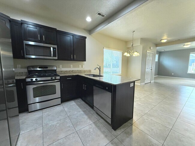 Building Photo - AVAILABLE JULY 1ST | 3 BED | 2.5 BATH | $2,295/MO