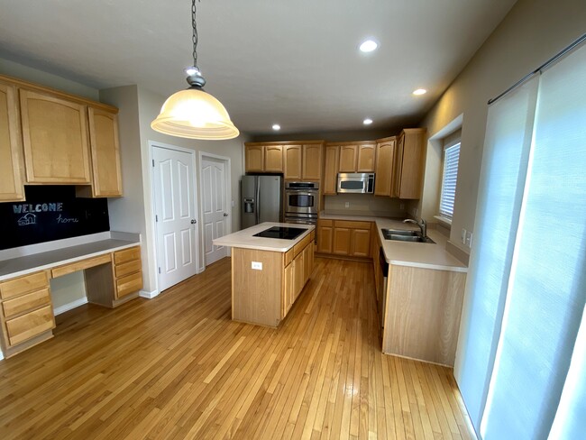 Gourmet Kitchen with desk - 14295 Chariots Whisper Dr