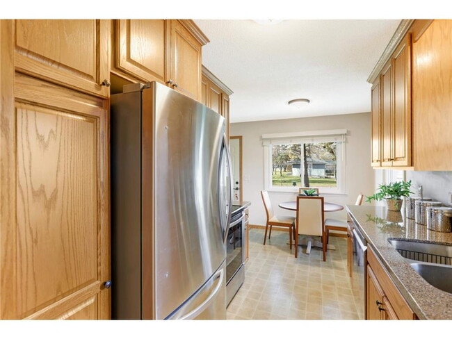 Building Photo - Spacious 4BR Home in Brooklyn Park – Huge Basement & New Appliances!